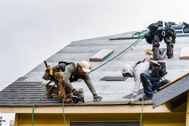 Professional Roofing technician working in Huntington, NY